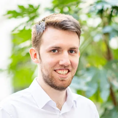Profile photo of James Bithell smiling